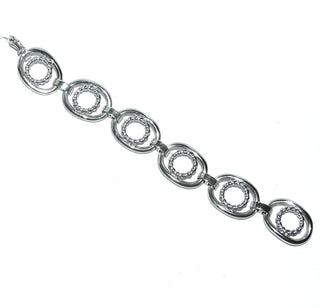 dekoratives Einzelstück, Vintage-Glieder-Armband, Design Katja Lührs, Lübeck aus massivem 835 Silber, poliert, 19 cm lang, 6 ovale, durchbrochene Elemente auf denen sich runde Kordel-Elemente befinden, Schlaufenverbindungen, Sicherheitsacht, um 1960 - Vintage-Schmuck nur im Onlineshop von danilogold!