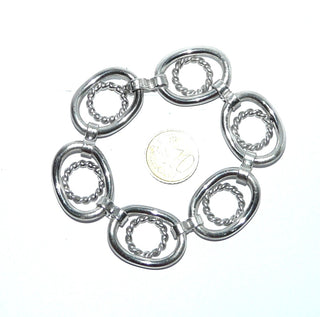 dekoratives Einzelstück, Vintage-Glieder-Armband, Design Katja Lührs, Lübeck aus massivem 835 Silber, poliert, 19 cm lang, 6 ovale, durchbrochene Elemente auf denen sich runde Kordel-Elemente befinden, Schlaufenverbindungen, Sicherheitsacht, um 1960 - Vintage-Schmuck nur im Onlineshop von danilogold!
