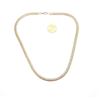 flaches Einzelstück, Retro-Collier, flexibler Halsreif aus flach gewalztem, engmaschigen Panzermuster ähnlich einer Omega-Halskette aus 925 Silber vergoldet mit rhodinierten Akzenten, Gesamtlänge 45 cm, 5,2 mm breit mit Karabiner, um 1980. Vorderseite zweifarbig, Rückseite glatt vergoldet, beidseitig tragbar-	Nur erhältlich im Onlineshop von Juwelier & Goldschmiede Danilo!