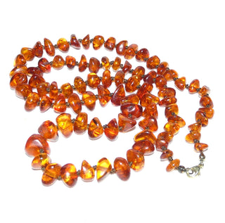 Handpoliertes Einzelstück, Bernstein-Kette aus dicken polierten Linsen-Nuggets, im Verlauf durchgeknotet, mittleres Cognac-orange mit schönen Einschlüssen, Verschluß aus Gold-Doublé, Gesamtlänge 74 cm -	Handgefertigter Schmuck nur erhältlich bei www.danilogold-shop.de 