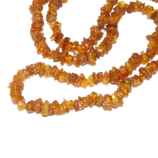 Einzelstück, Bernstein-Kette aus leicht anpolierten kleinen Natur-Splittern / Chips, ungeknotet, dunkleres Cognac-orange, ohne Verschluß, Gesamtlänge 78 cm -	Nur erhältlich im Onlineshop von Juwelier & Goldschmiede Danilo!