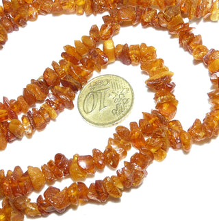 Einzelstück, Bernstein-Kette aus leicht anpolierten kleinen Natur-Splittern / Chips, ungeknotet, dunkleres Cognac-orange, ohne Verschluß, Gesamtlänge 78 cm -	Nur erhältlich im Onlineshop von Juwelier & Goldschmiede Danilo!