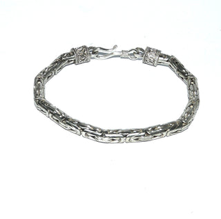 Einzelstück, rundes Königskordel-Armband, auch als Herrenarmband geeignet, aus massivem 925 Silber, liegt eher wie ein Armreif, poliert, 21 cm lang, Durchmesser 5 mm, verzierte Endkappen, Hakenverschluß -	Nur erhältlich im Onlineshop von Juwelier & Goldschmiede Danilo!