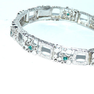 schmales Vintage-Armband, Glieder-Armband mit grünen Smaragd-Repliken, Stiftbewegung, wirkt eher wie ein Armreif, aus massiv 835 Silber, 17,5 cm lang, Kastenschloß, Sicherheitsacht, um 1960-1970 -	Nur erhältlich bei www.danilogold-shop.de