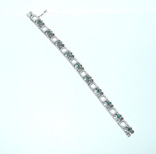 schmales Vintage-Armband, Glieder-Armband mit grünen Smaragd-Repliken, Stiftbewegung, wirkt eher wie ein Armreif, aus massiv 835 Silber, 17,5 cm lang, Kastenschloß, Sicherheitsacht, um 1960-1970 -	Nur erhältlich bei www.danilogold-shop.de