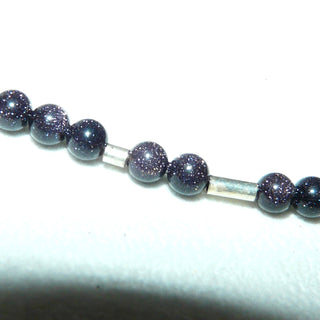 in unserer Werkstatt designtes Einzelstück, zarte Kugel-Kette aus dunkelblau-violettem Blaufluß mit dezentem Glitzern, Gesamtlänge 44 cm, Verschluß und Zwischenteile aus 925 Silber, auf Stahlseil aufgereiht, Stein-Durchmesser 4 mm -	Einzelstücke nur erhältlich bei www.danilogold-shop.de