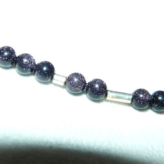in unserer Werkstatt designtes Einzelstück, zarte Kugel-Kette aus dunkelblau-violettem Blaufluß mit dezentem Glitzern, Gesamtlänge 44 cm, Verschluß und Zwischenteile aus 925 Silber, auf Stahlseil aufgereiht, Stein-Durchmesser 4 mm - Einzelstücke nur erhältlich bei www.danilogold-shop.de
